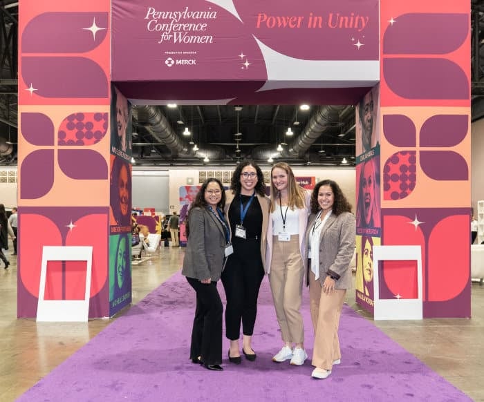 Pennsylvania Conference for Women 2024 attendes under Power in Unity tunnel